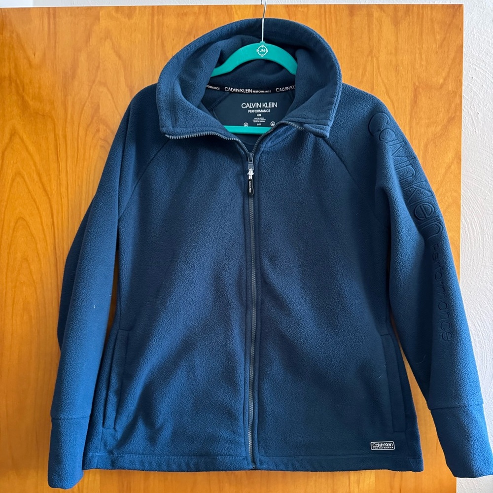 Calvin Klein size large teal fleece zip up with arm embroidery